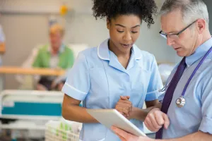 Doctor and nurse talking